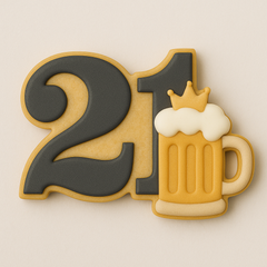 Cookie cutter in the shape of the number β21,β ideal for 21st birthday celebrations. Suggested decorations include colorful sprinkles, a classic beer mug to highlight the milestone in fun and vibrant style.